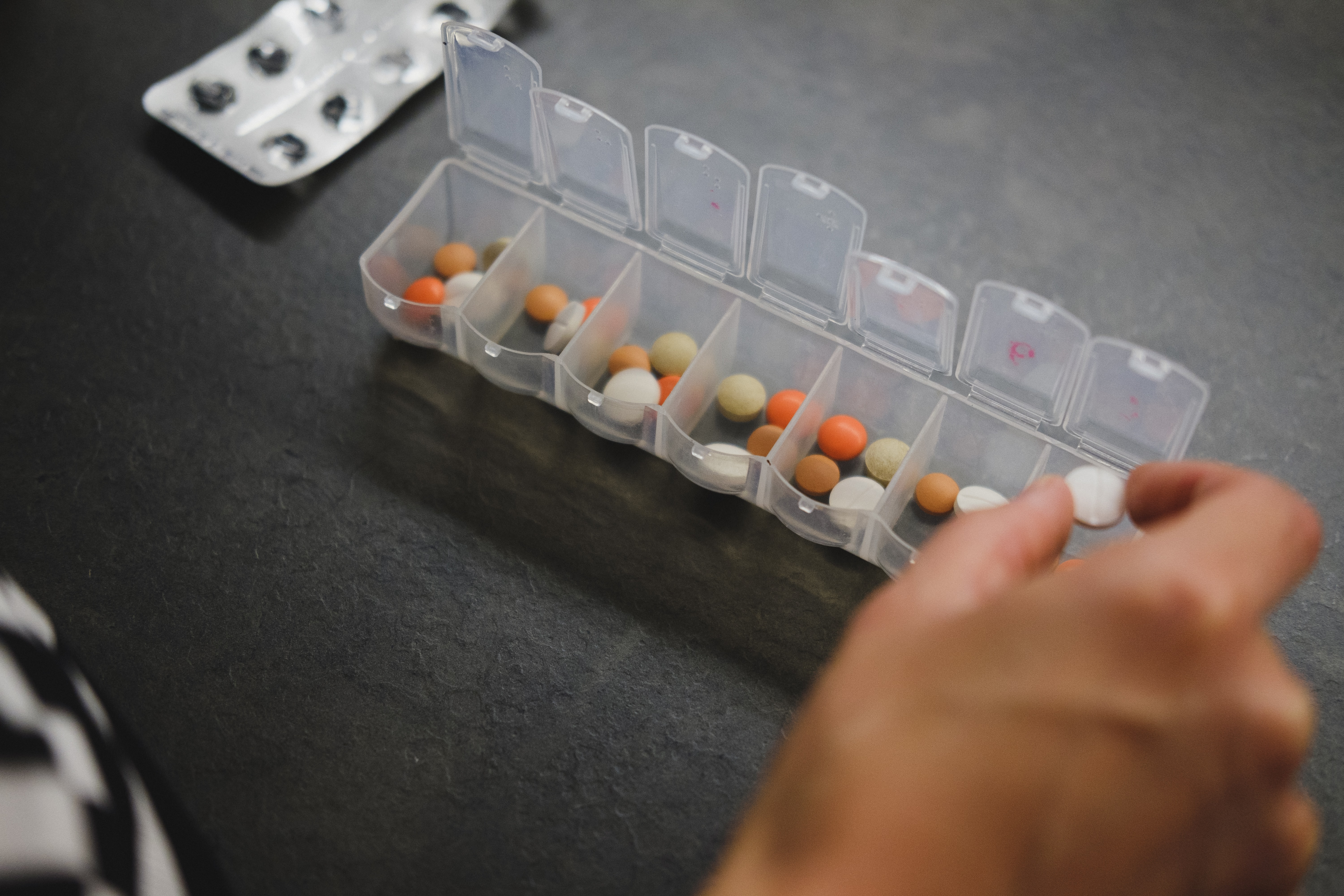 Pill box containing various supplements
