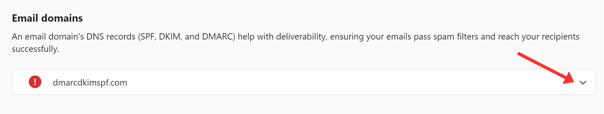 Click the arrow next to your domain to see DNS records 