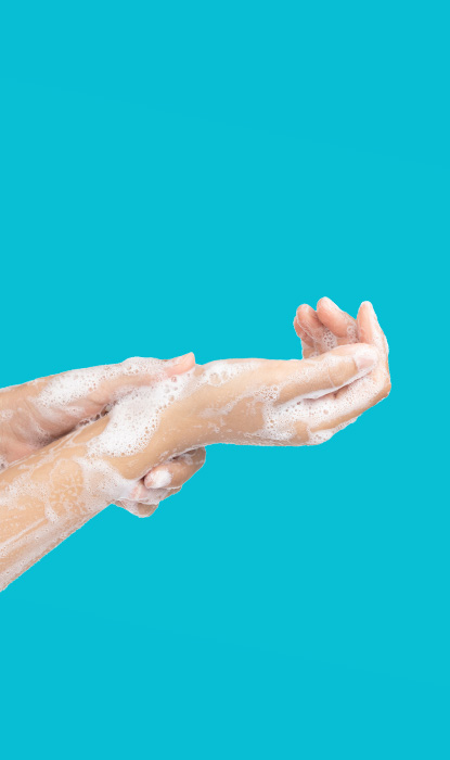 Female hands covered with soap