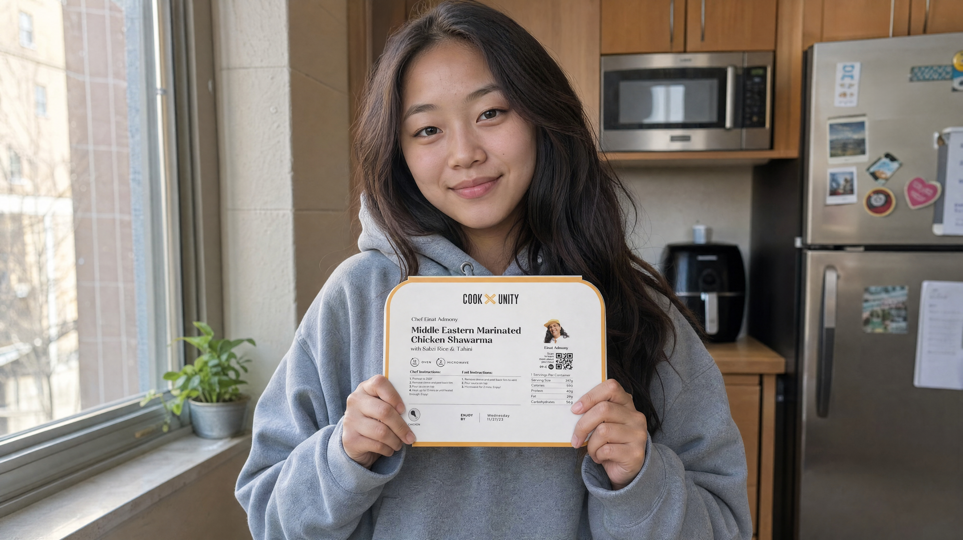 student with meal and microwave