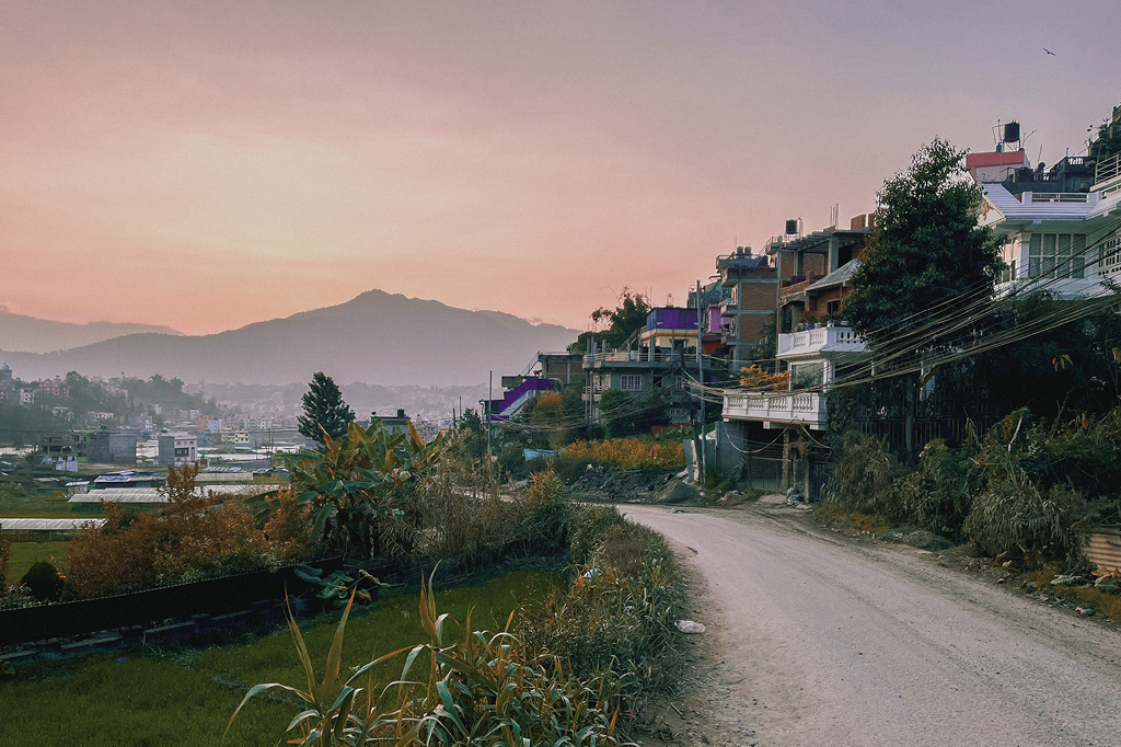 A pitoresk picture of a street in a city in nepal. 