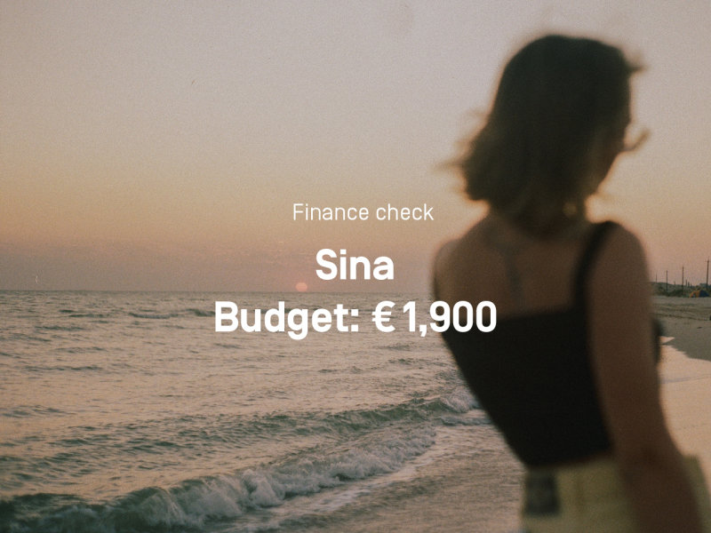 Photography of a woman on the beach. In the middle of the picture is written "Finance check Sina, Budget: € 1,900 