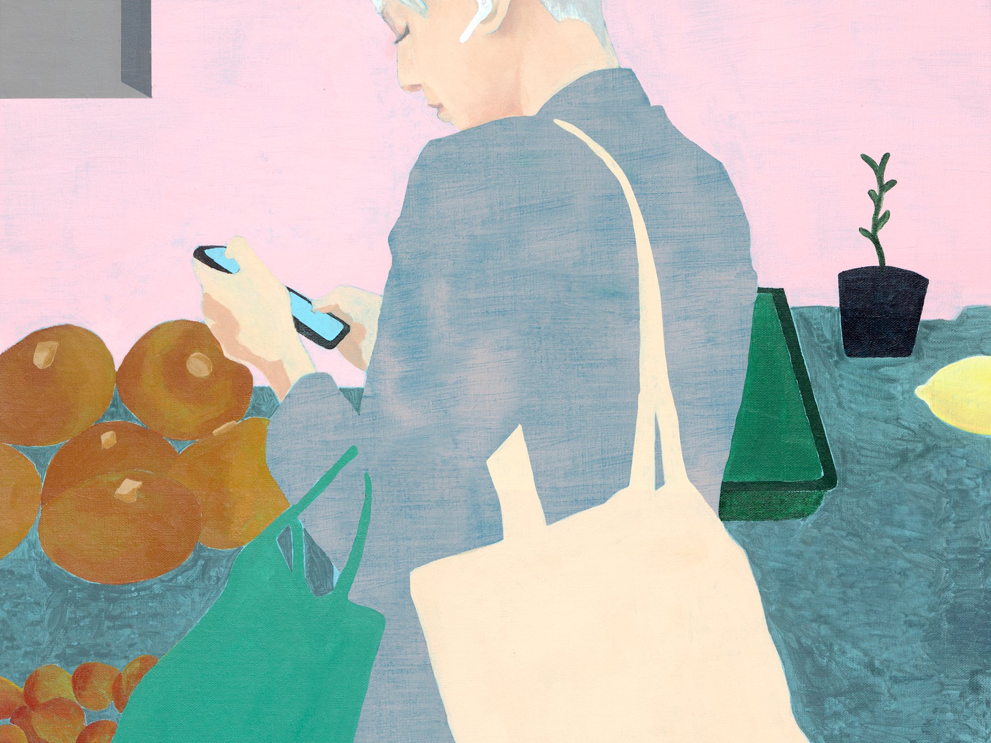 A woman with white hair looking on her mobile phone and carrying shopping bags on her shoulder