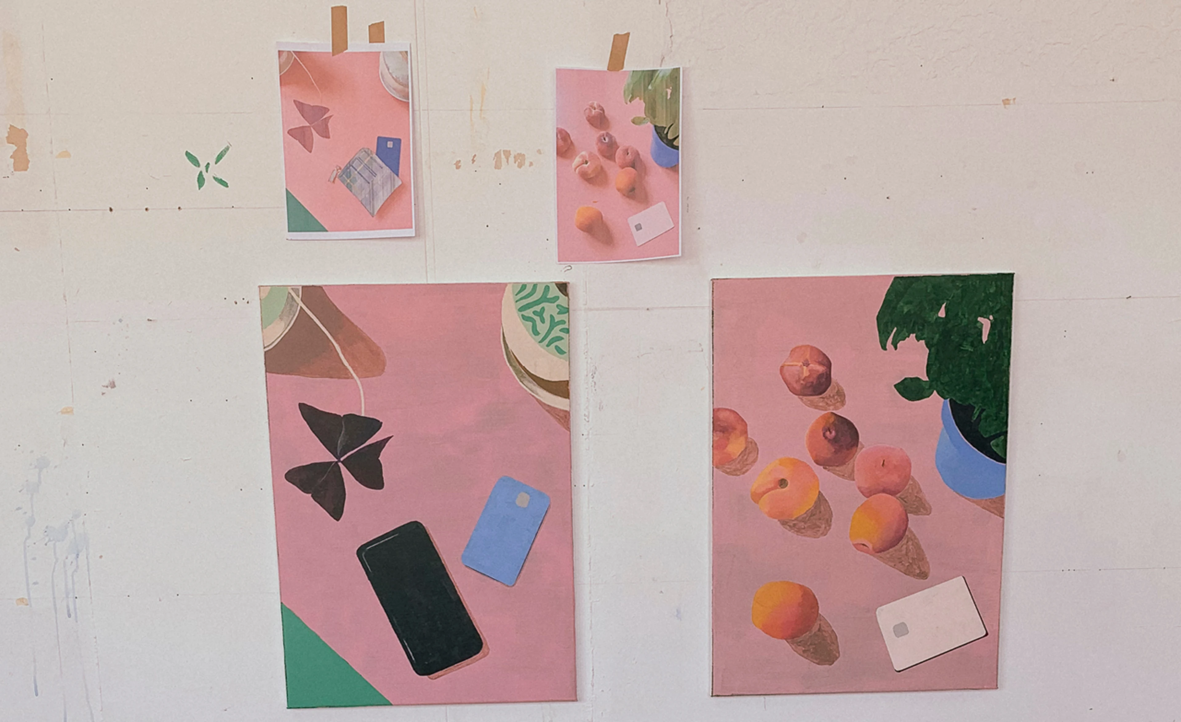 A selection of paintings on a wall