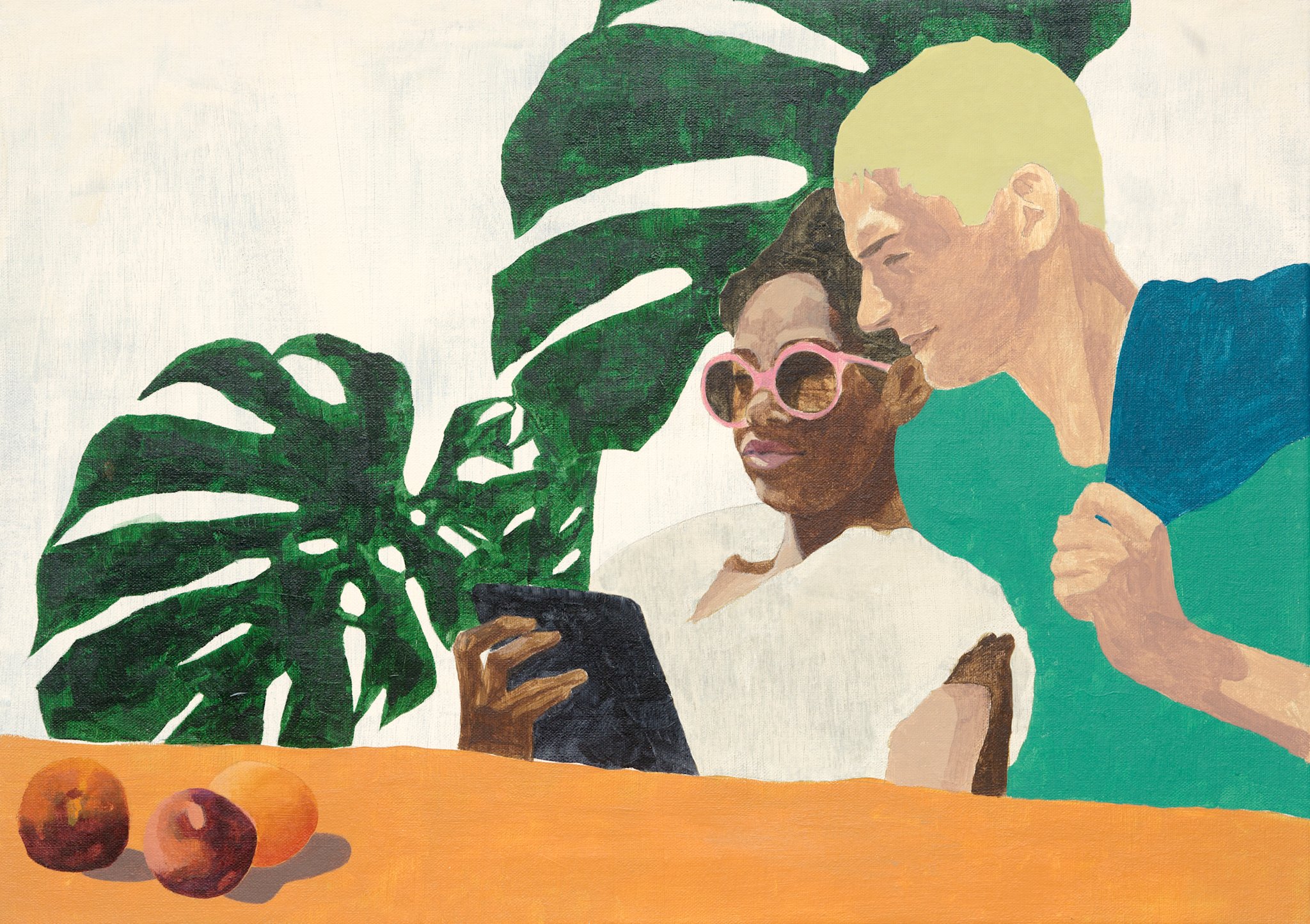 A man is looking over the shoulder of a woman who's holding a tablet