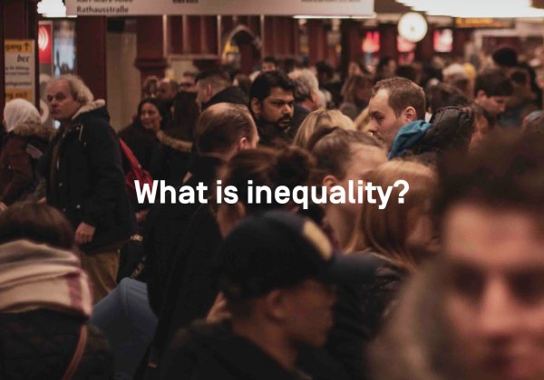 Photo of crowded train station with text "what is inequality" on it