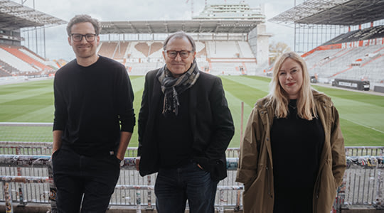 Jakob, Silvi and Ewald Lienen insight the Millerntorstadium in Hamburg