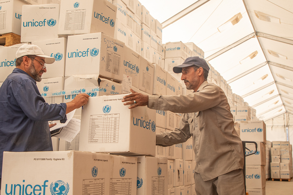 The packed aid packages are registered and prepared for onward transportation