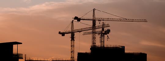 Baustelle als Symbolbild, Sonnenuntergang, Gebäude