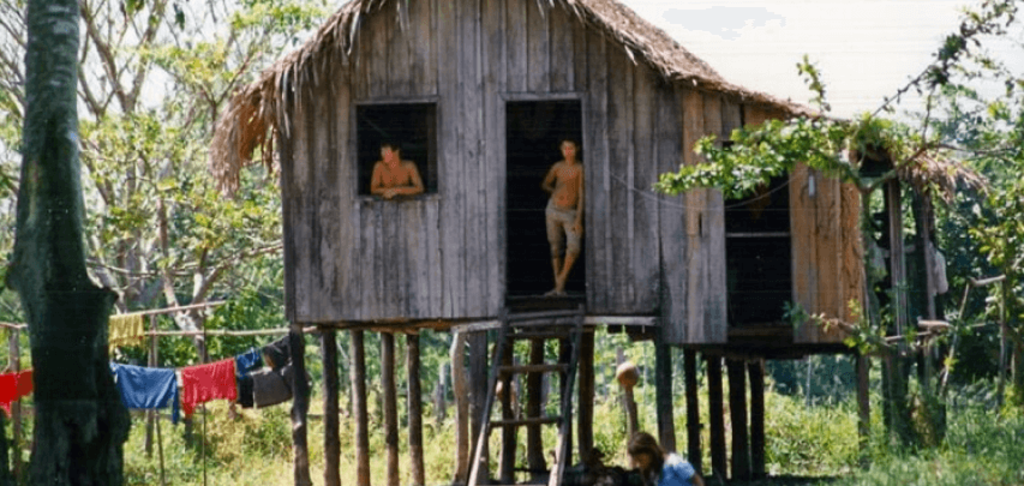 A wooden house on poles in Brasils rainforest