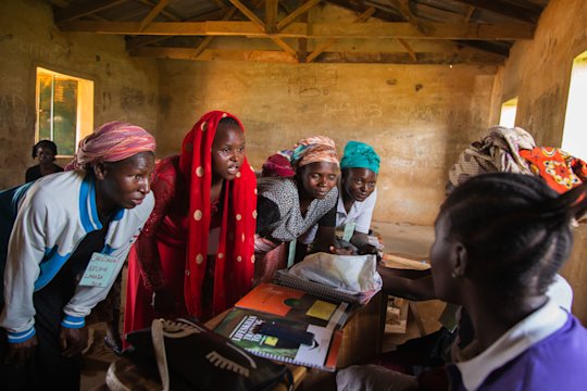 The picture shows participants of the program in Nigeria in their training room