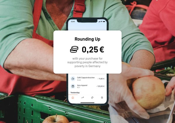 In the background is a picture where a women is giving an apple to another person. In the front is a picture of the Rounding Up-Feature saying "Rounding Up 0,25 € with your purchase for supporting people affected by poverty in Germany".