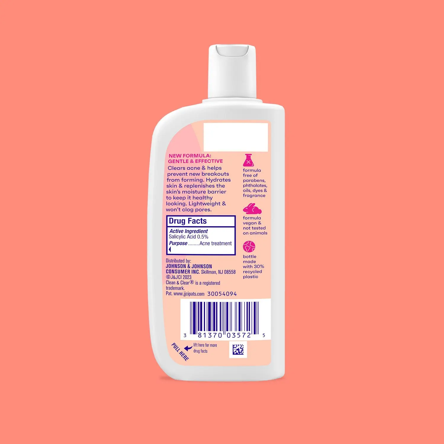 White plastic bottle displays skincare product details against peach background. Text highlights: "NEW FORMULA: GENTLE & EFFECTIVE," salicylic acid for acne treatment, free from parabens, vegan, with 30% recycled plastic. Contact info and barcode visible.