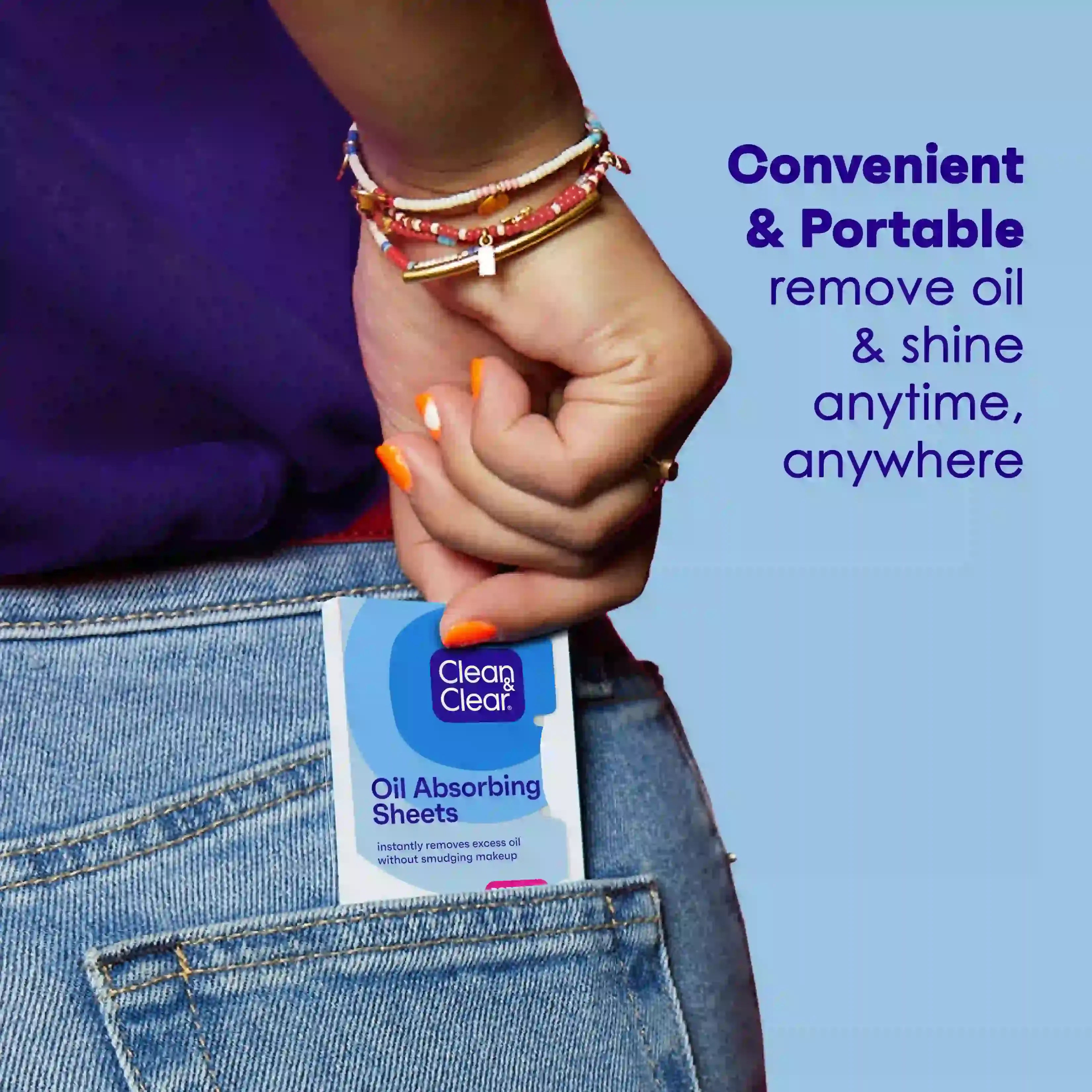Clean & Clear® Oil Absorbing Sheets in jeans pocket, convenient and portable for on-the-go use