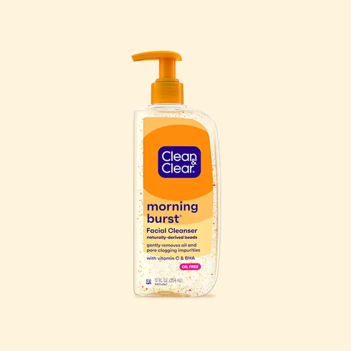 A clear plastic bottle with an orange pump contains "Clean & Clear Morning Burst Facial Cleanser." Text highlights naturally-derived beads for oil removal and pore cleansing. Label mentions vitamin C & BHA, oil-free, 12 fl. oz.