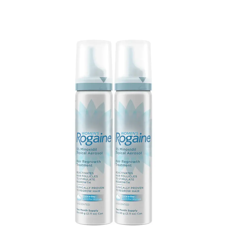 Two silver bottles of Women's ROGAINE® Foam on a white background.
