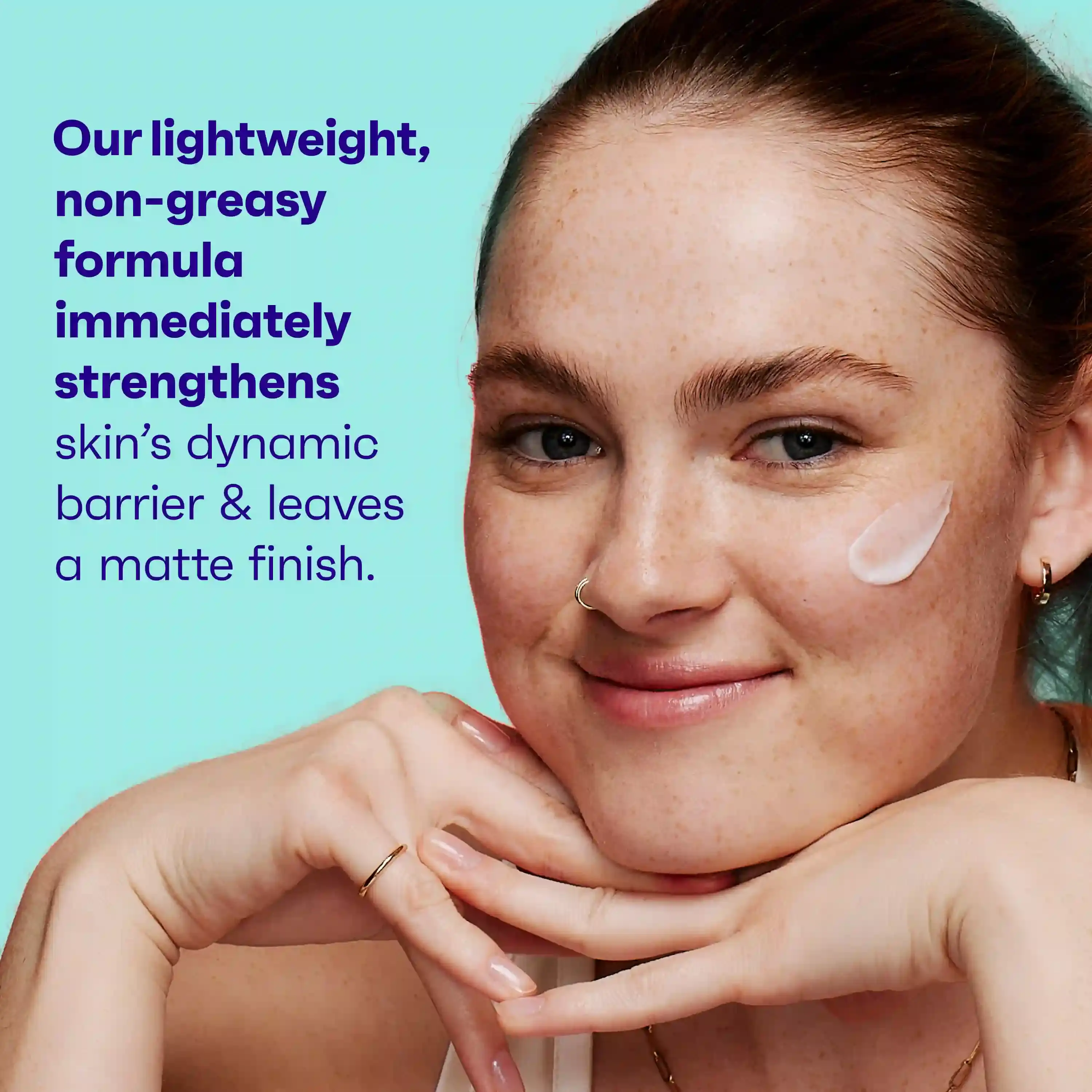 Woman with Clean & Clear® Daily Mattifying Moisturizer applied to her face, a lightweight non-greasy formula that strengthens skin's dynamic barrier and leaves a matte finish
