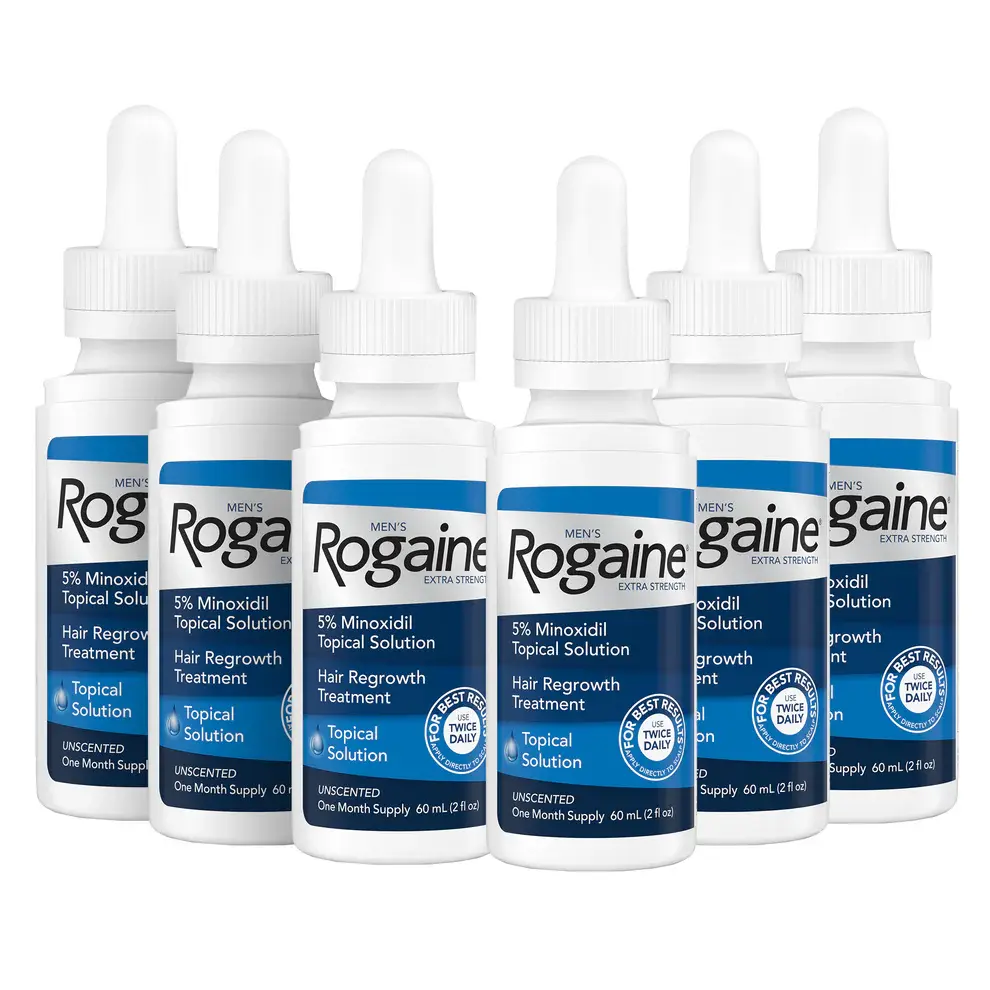 Six silver bottles of Men's ROGAINE® Solution on a white background.
