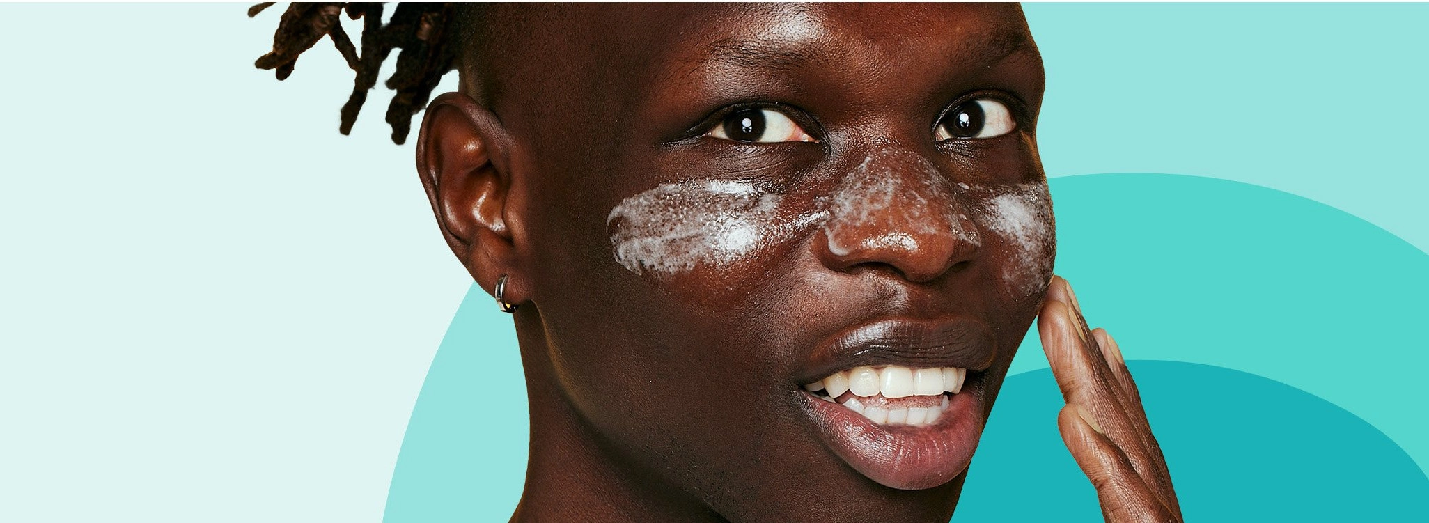 Article banner featuring an image of a young person applying Clean & Clear Acne Spot Treatment on her face, illustrating practical skincare routines for achieving healthy skin.