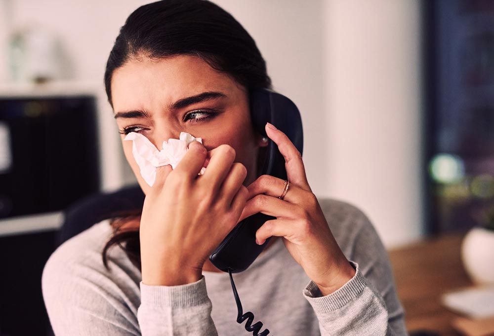 Woman with nasal congestion