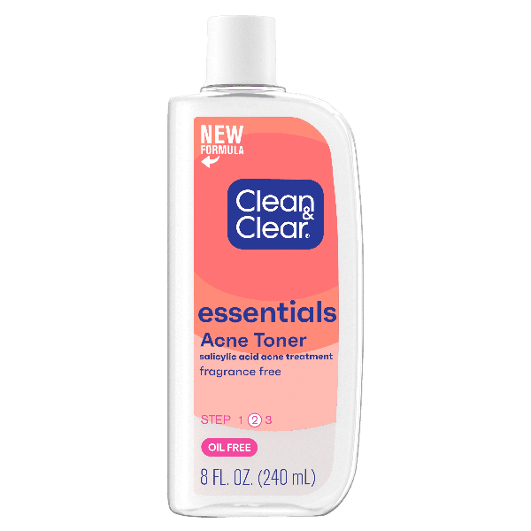 A white bottle labeled "Clean & Clear Essentials Acne Toner" features a pink background with the text "NEW FORMULA, salicylic acid acne treatment, fragrance free, STEP 1 2 3, OIL FREE, 8 FL OZ (240 mL)."