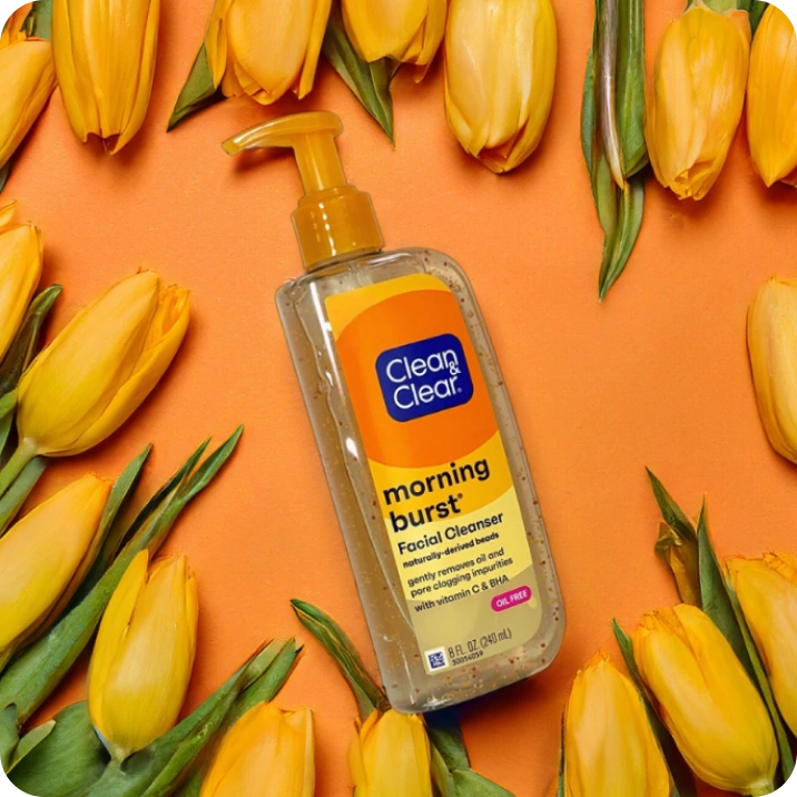Clean & Clear® Morning Burst® Facial Cleanser surrounded by yellow tulips