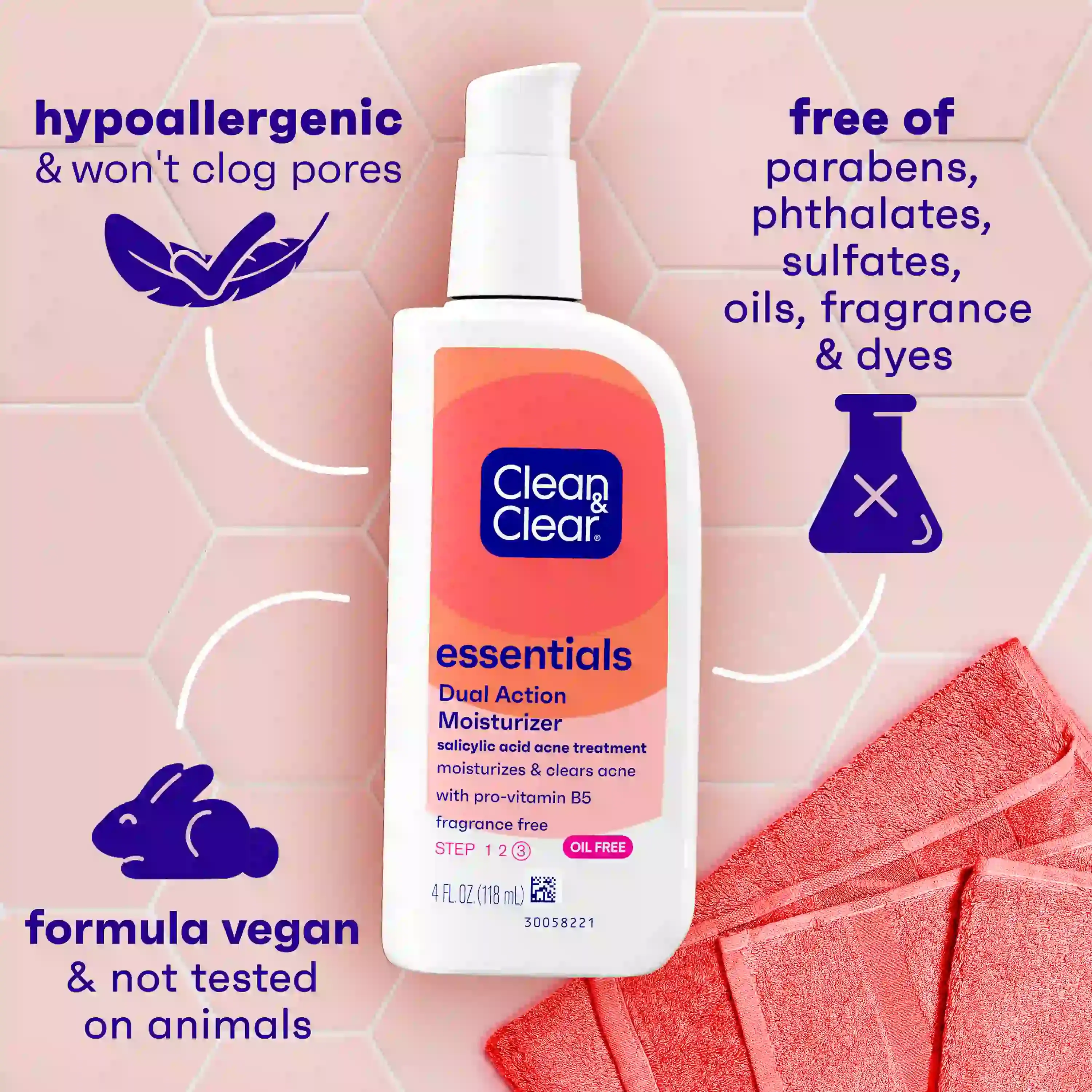 Clean & Clear® Dual Action Moisturizer, hypoallergenic, vegan, paraben-free with coral towel nearby