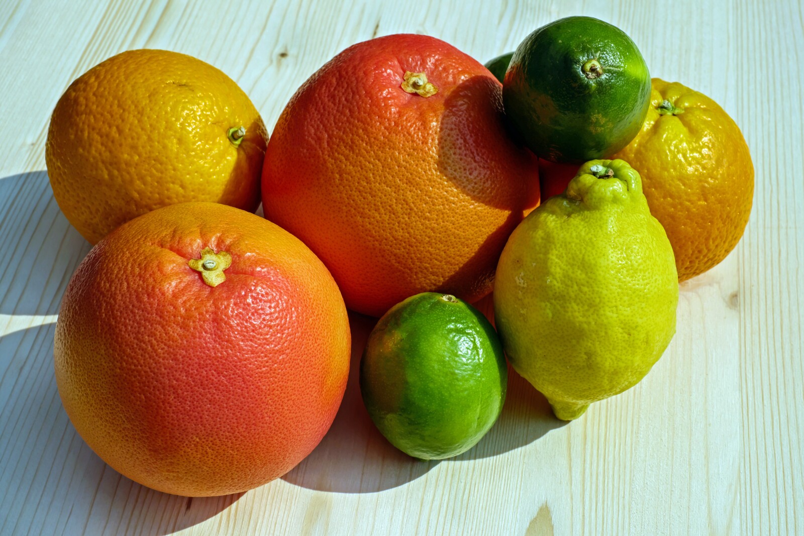 a group of citrus fruits 
