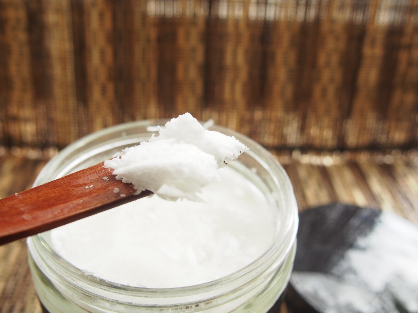 coconut oil on a wooden spoon