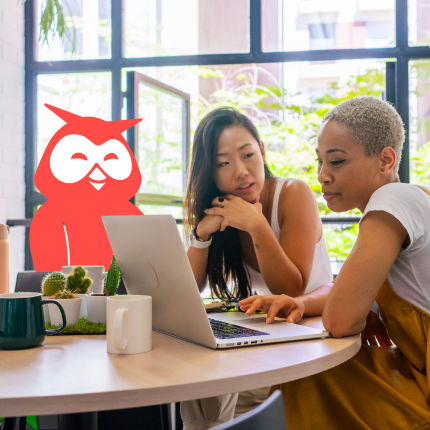 Image of Owly working with two people at a desk