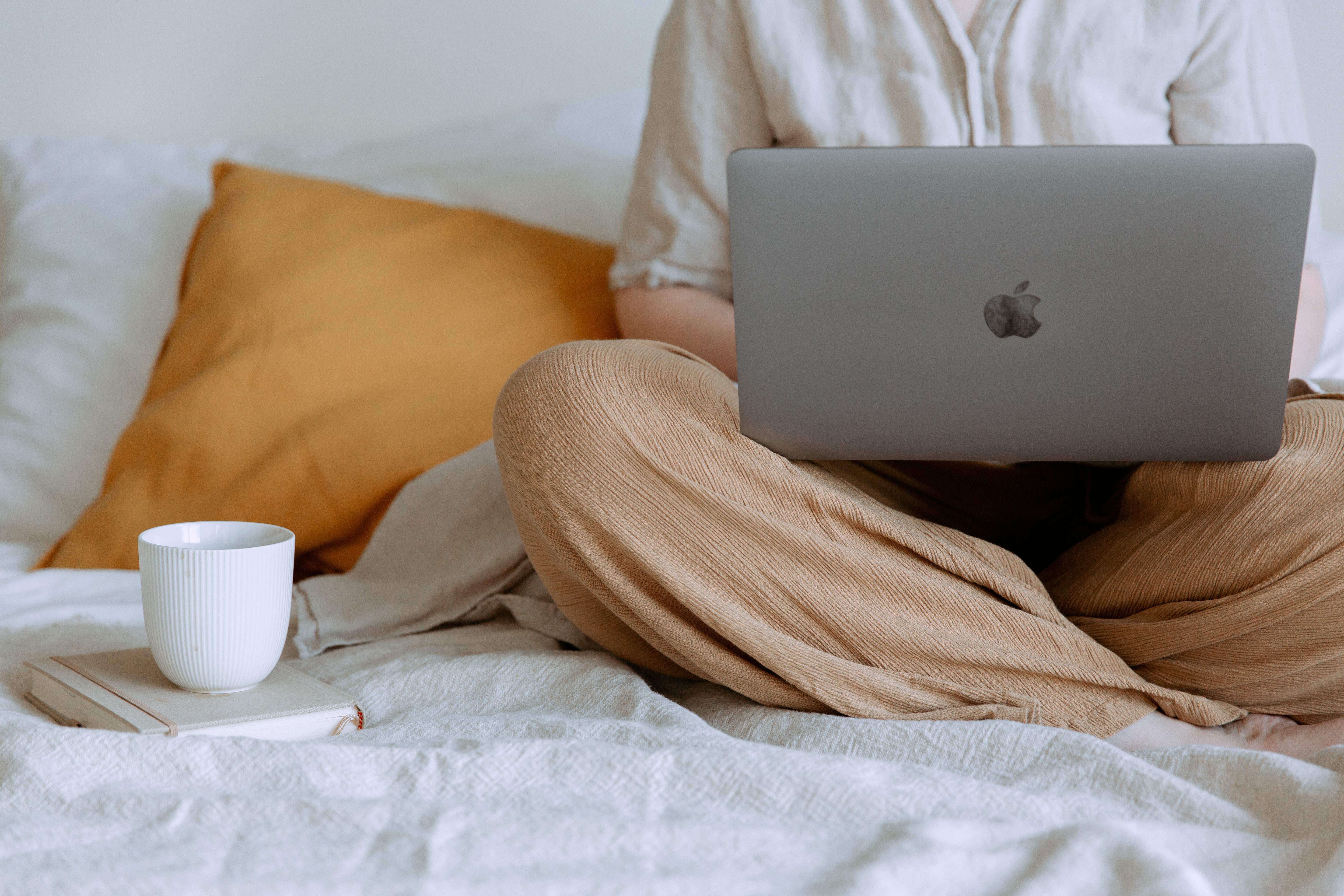 cropped woman on laptop