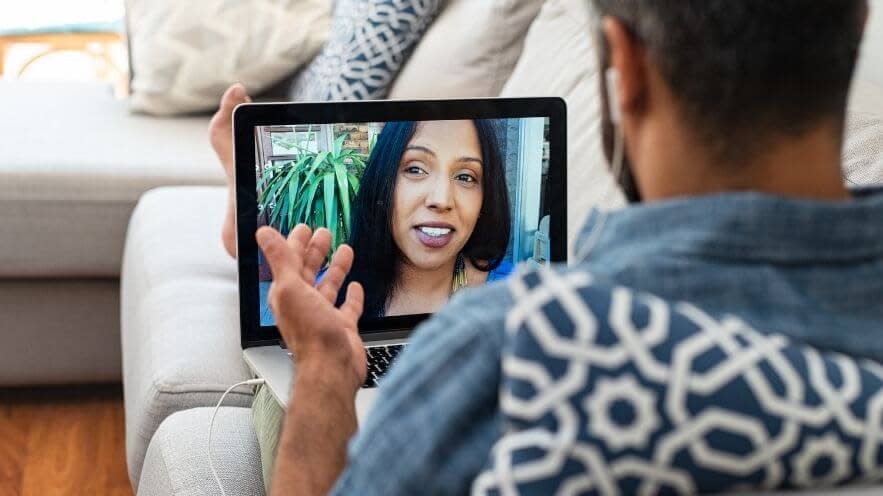 Man and woman using video chat API