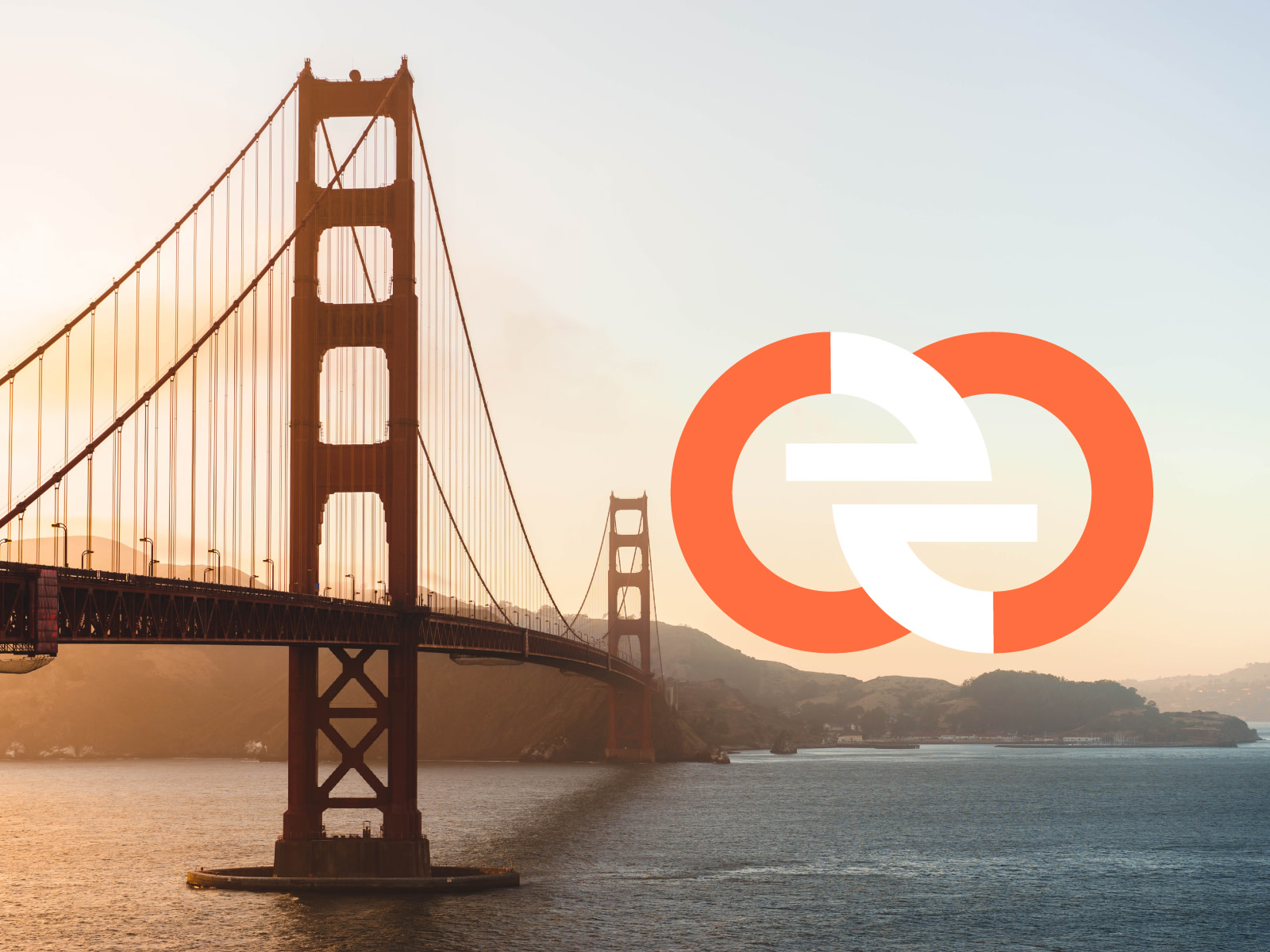 Golden Gate Bridge in San Francisco at sunrise with the logo of Simpleen Translation in orange and white in the background.