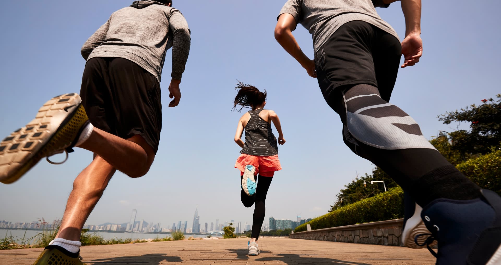 three friends running banner