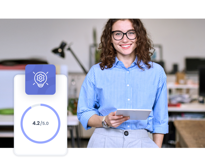 Image of a happy employee with app screen from Eletive showing high score and symbol for intelligent pulse survey
