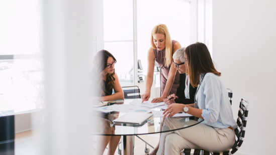 Group of professionals working together at the office