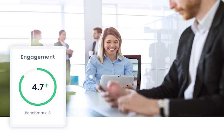 Picture of engaged employees interacting with technology