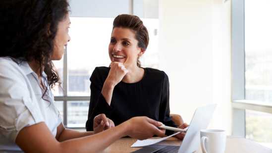 Two women with laptop 1:1