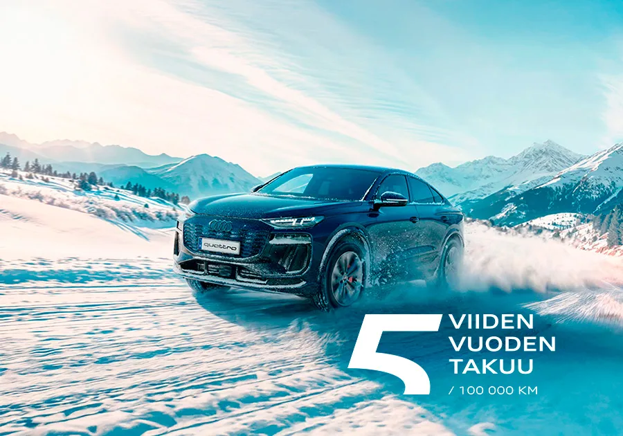 Audi quattro ajaa lumisella tiellä