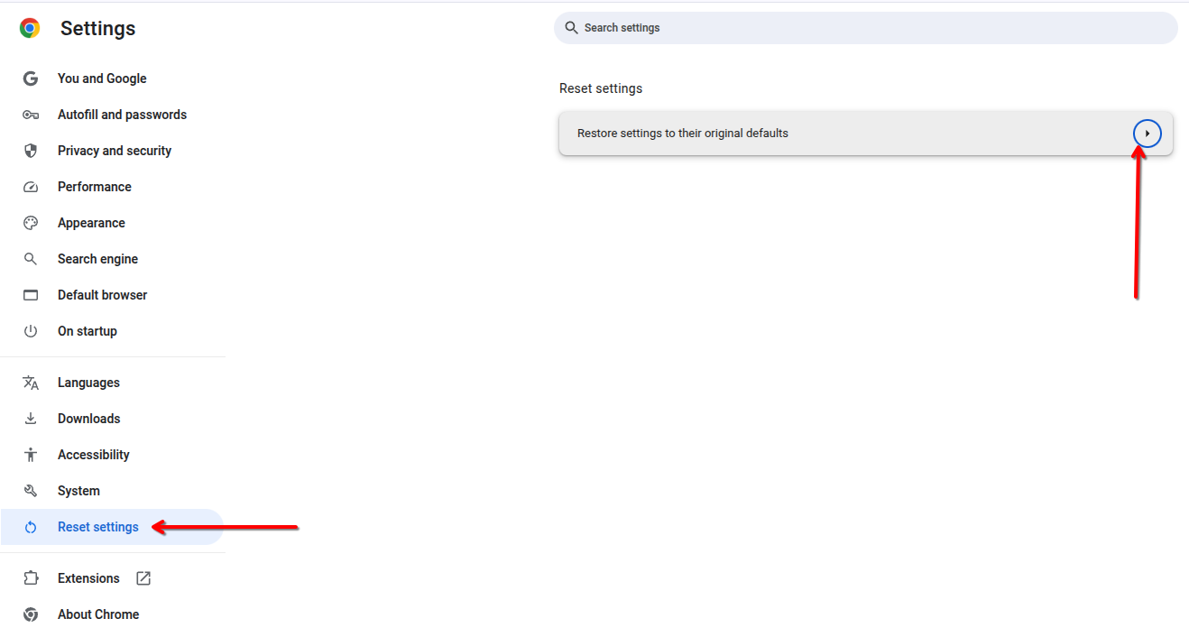Reset settings option in Chrome showing the “Restore settings to their original defaults” button.