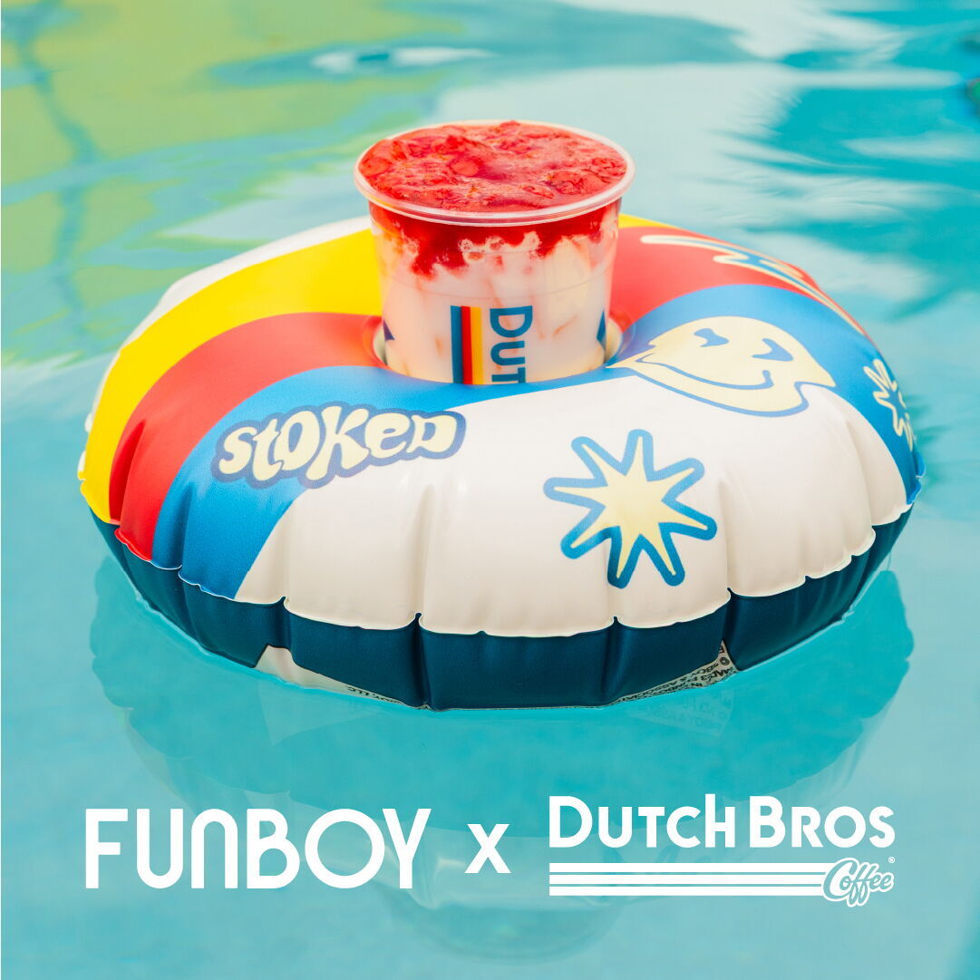 Dutch Bros drink with red topping floating in colorful pool float on turquoise water, FUNBOY x Dutch Bros collaboration.