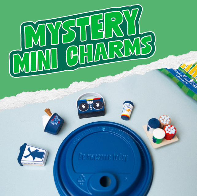 "Mystery Mini Charms" text over small collectible trinkets surrounding a blue lid on green background.