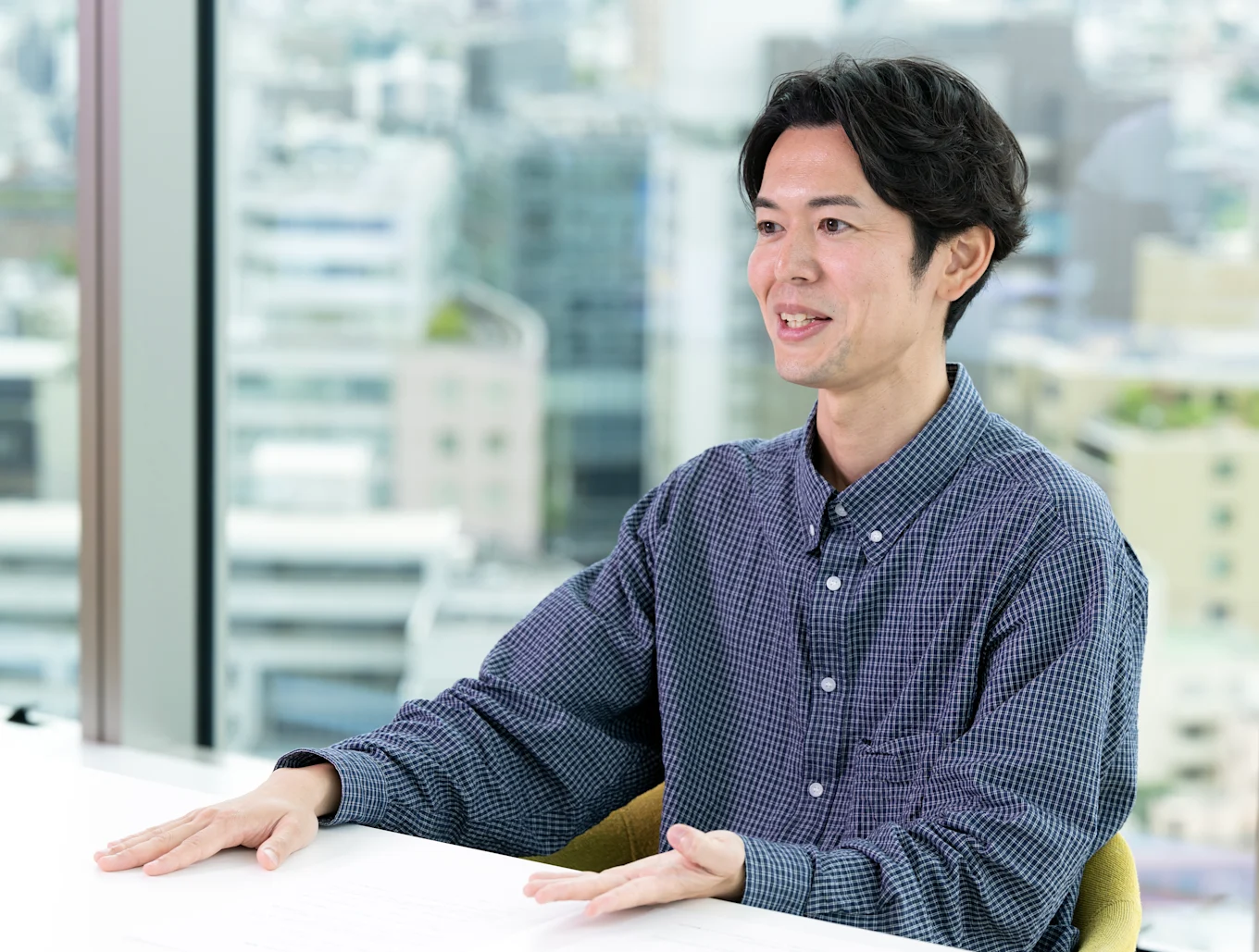 インタビューを受けるEXIT新野代表