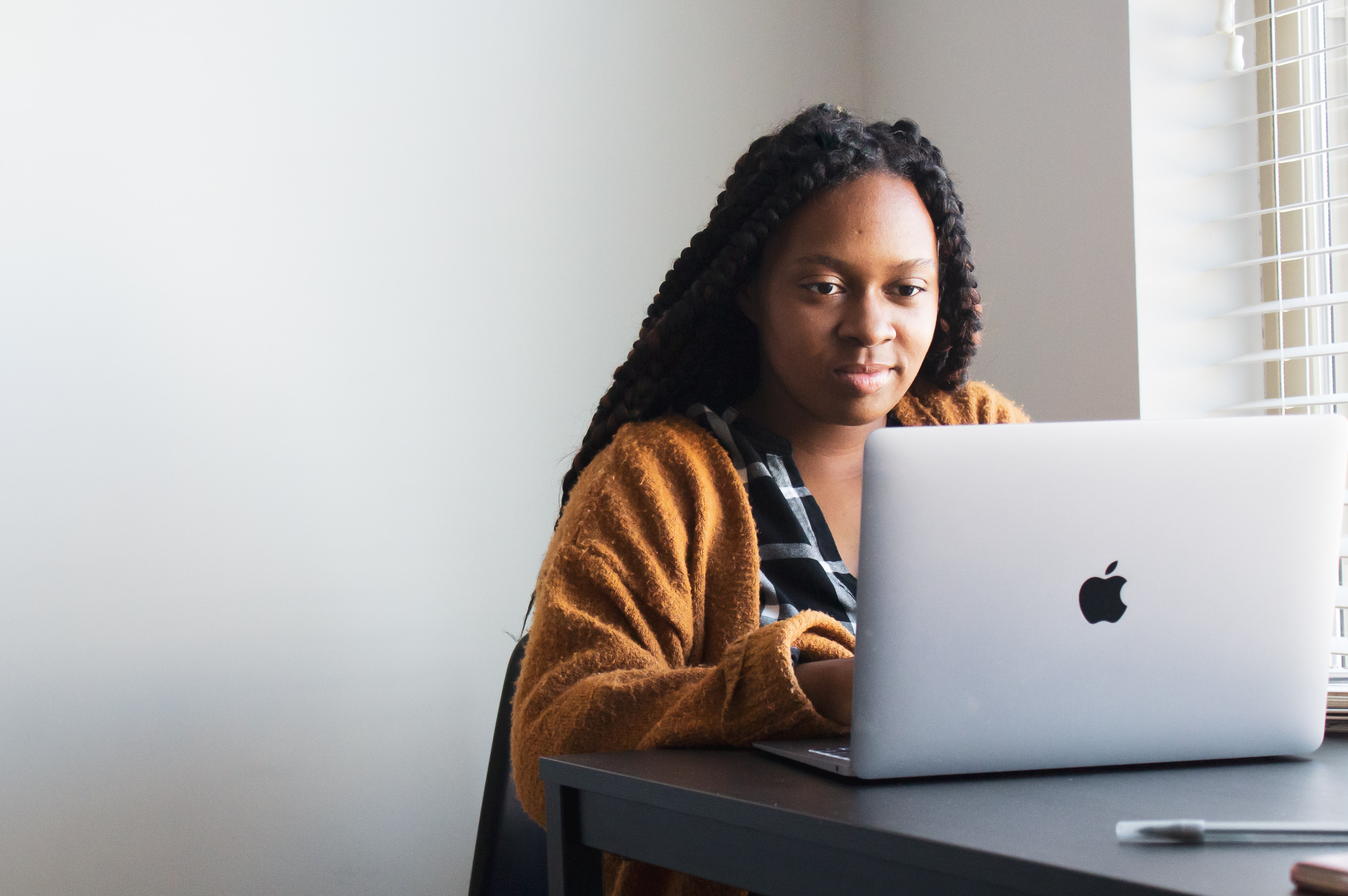 A woman working on her laptop