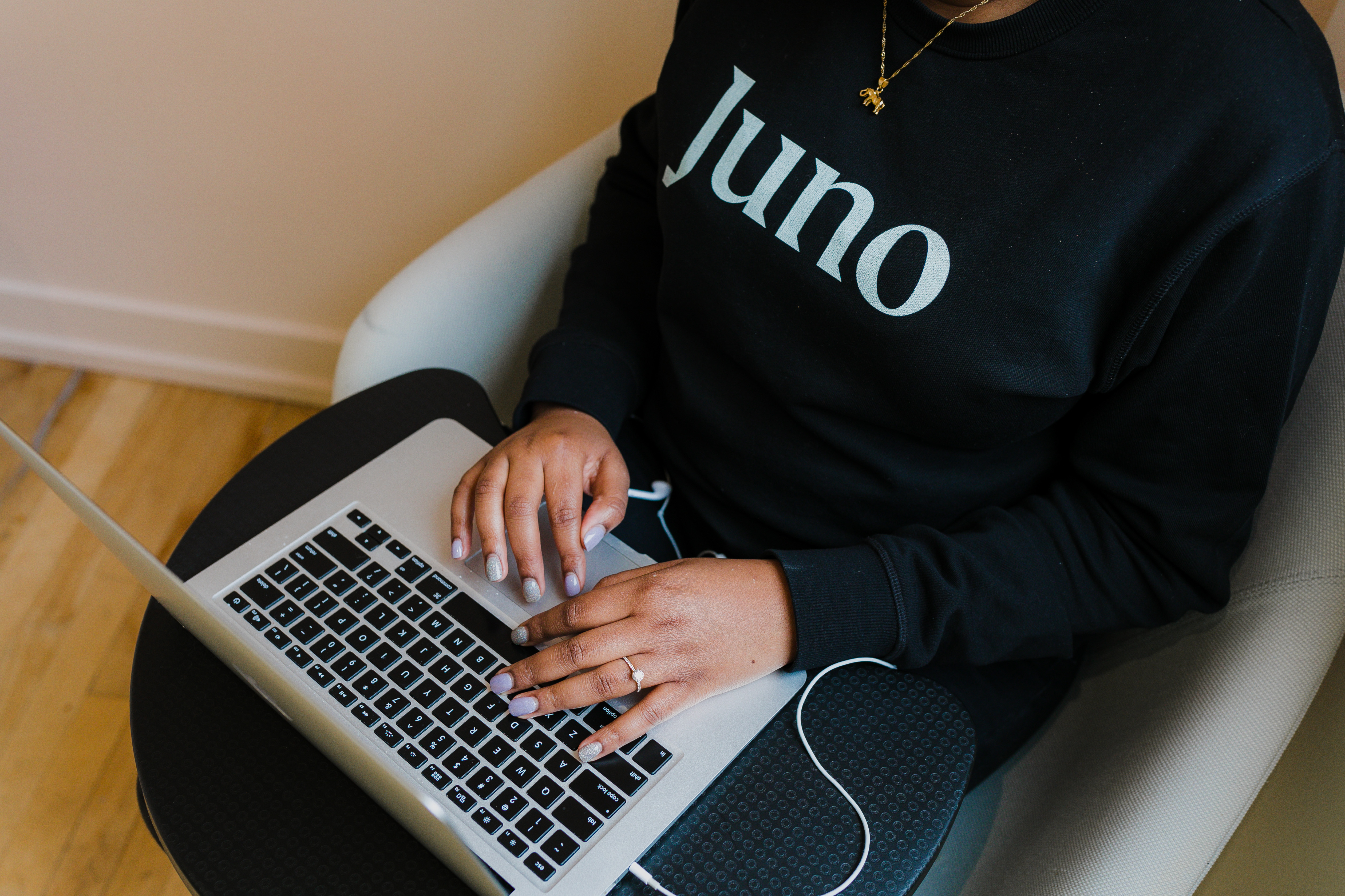 Girl typing on laptop