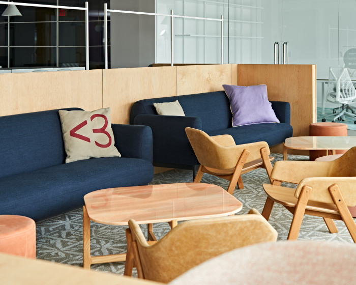 A cozy seating area at Coral, Juno College of Technology's inclusive coworking and community space in Toronto