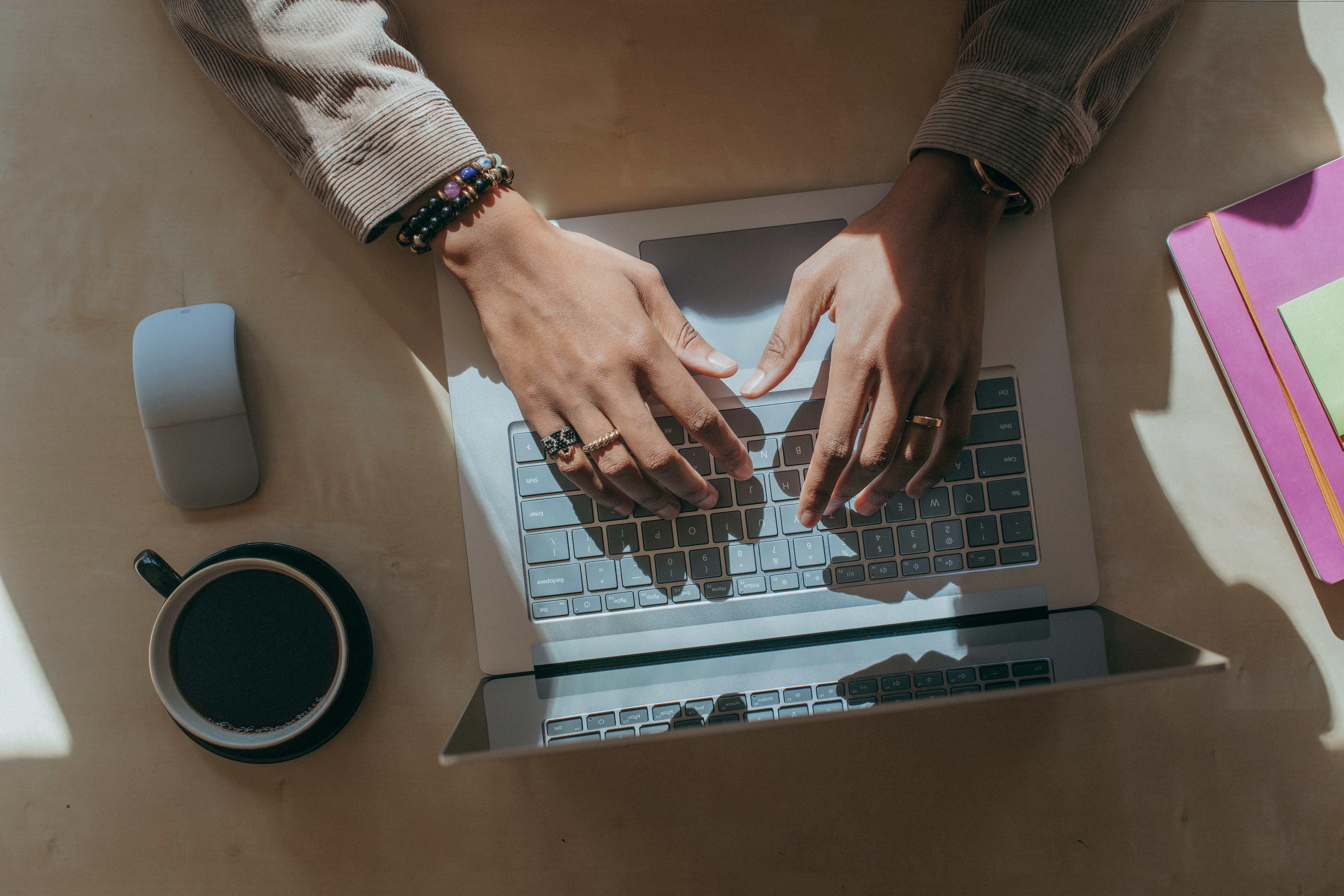 Man typing on a laptop