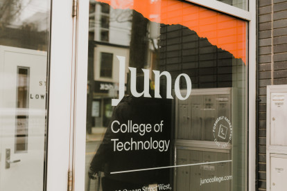 Glass front door of Juno's downtown Toronto campus