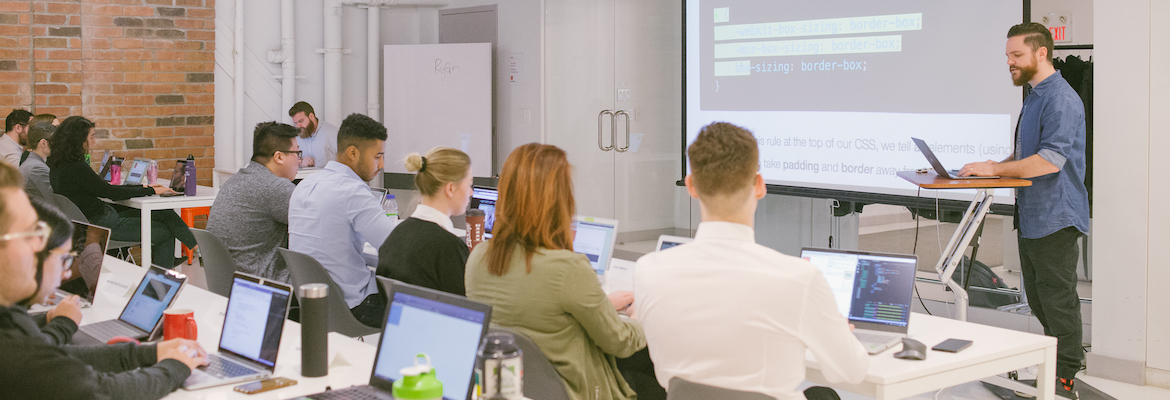 HackerYou Cohort 18 in the classroom learning