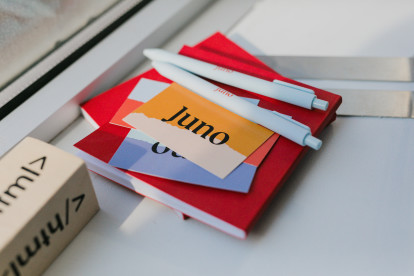 Juno cards and pens on notebook